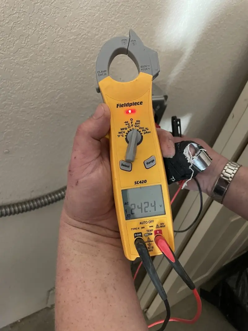 Voltage testing with clamp meter during Electrical Installation Services in Gig Harbor